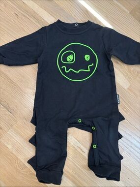 Loud Apparel Black Baby One-Piece Footie with Neon Green Smiley